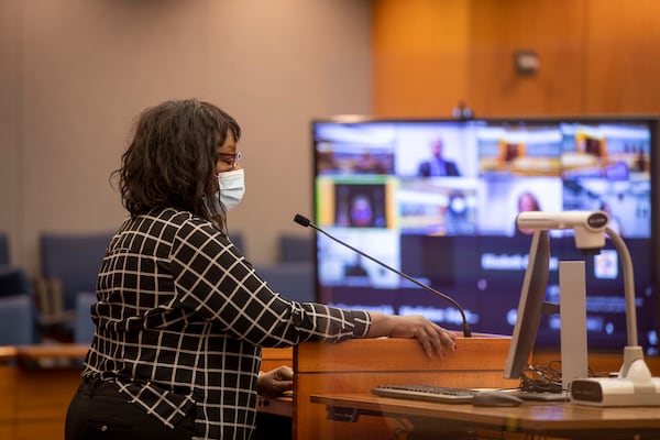 07/20/2021 — Atlanta, Georgia — Mattie Sanders, a landlord who owns property in Atlanta, speaks with Municipal Court Judge Judge Rashida Oliver over a video call during a dispossessory proceeding at the Fulton County Courthouse in Atlanta, Tuesday, July 20, 2021.  (Alyssa Pointer/Atlanta Journal-Constitution)