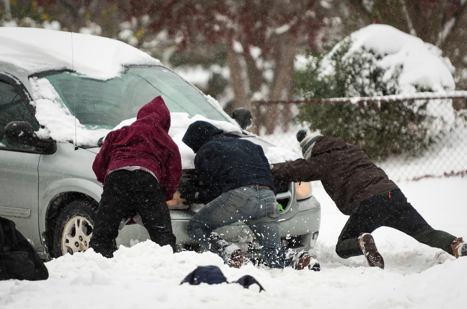 Photos: Winter storm blankets South in snow, ice