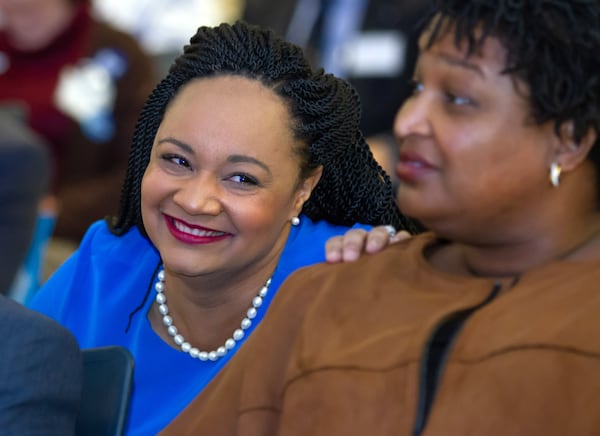 State Sen. Nikema Williams, left, talks with Stacey Abrams, the Democratic nominee for governor in 2018 and 2022, during the 2019 Georgia Democratic Party State Convention in Atlanta. Williams was elected chair of the state party that year, and she position Georgia as an emerging battleground in the 2020 presidential race, when Joe Biden narrowly won the state. The state party also scored major wins that same election cycle when Jon Ossoff and Raphael Warnock each won runoff races for the U.S. Senate, giving Democrats control of the chamber. STEVE SCHAEFER / SPECIAL TO THE AJC