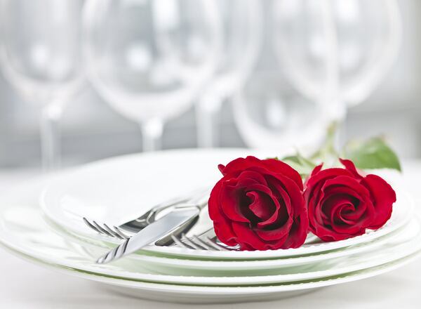 Do you know the etiquette do’s and don’t’s of Valentine’s Day dining? AJC file photo