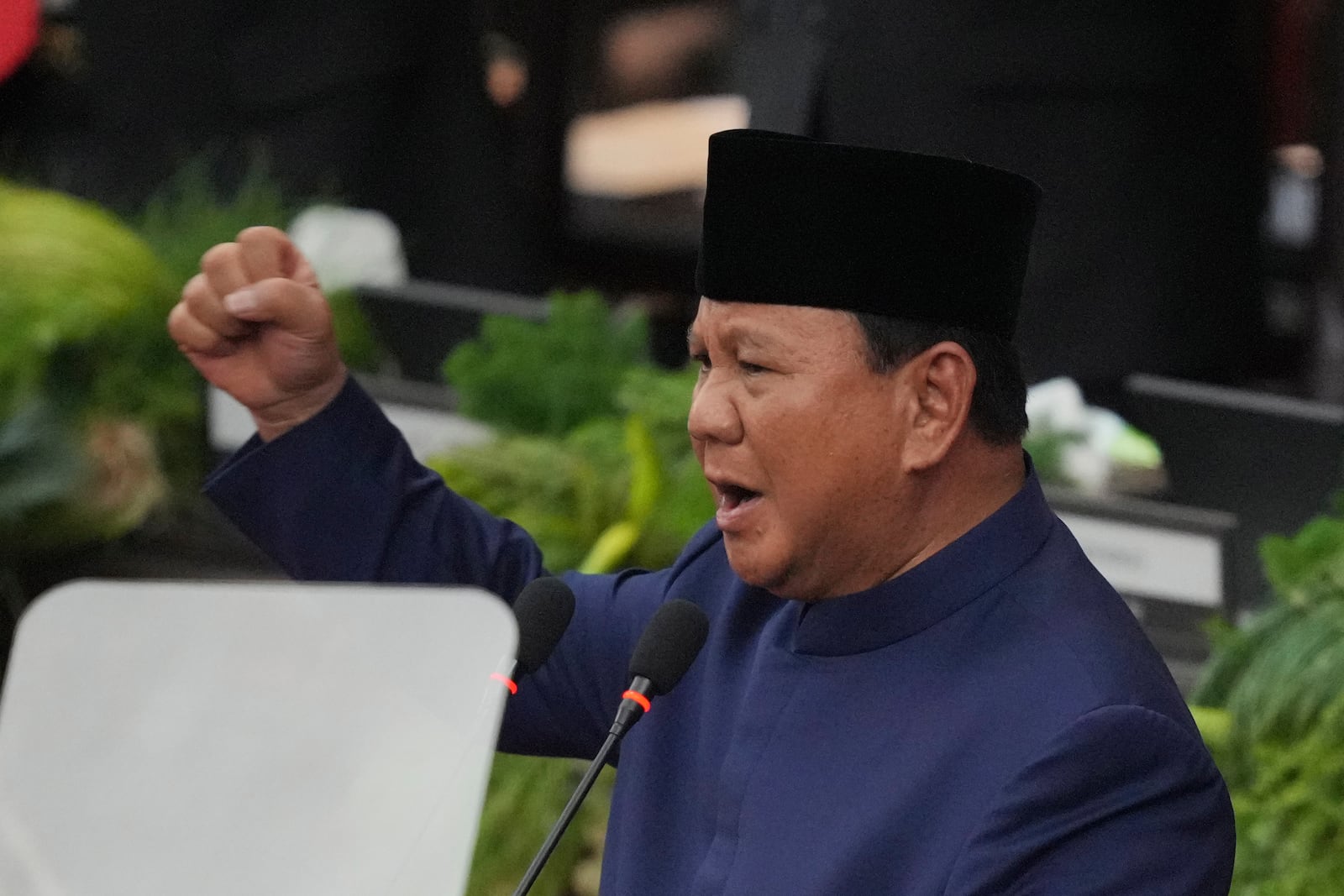 Indonesia's newly-inaugurated Indonesian President Prabowo Subianto delivers a speech during the presidential inauguration ceremony at the Parliament building in Jakarta, Indonesia, Sunday, Oct. 20, 2024. (AP Photo/Tatan Syuflana)