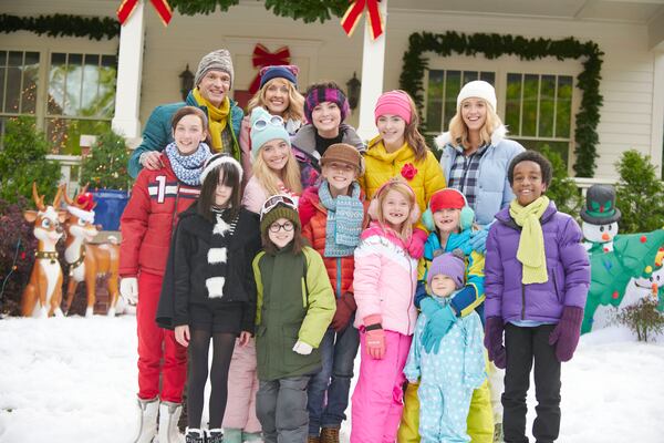 Atlanta actress Morgan McGill (left, wearing the red No. 1 coat) plays Lynn Loud in the Atlanta-filmed "A Loud House Christmas."