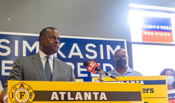 Former mayor Kasim Reed accepts an endorsement from the International Association of Fire Fighters Local 134 at Reed's campaign headquarters on Thursday, Oct. 7, 2021.  (Jenni Girtman for The Atlanta Journal-Constitution)