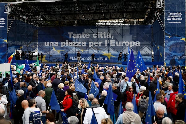 People gather on the occasion of a Pro-Europe demonstration asking for more cohesion in the EU on the wake of the recent changes of priorities in International politics, in Rome, Saturday, March 25, 2025. (Cecilia Fabiano/LaPresse via AP)