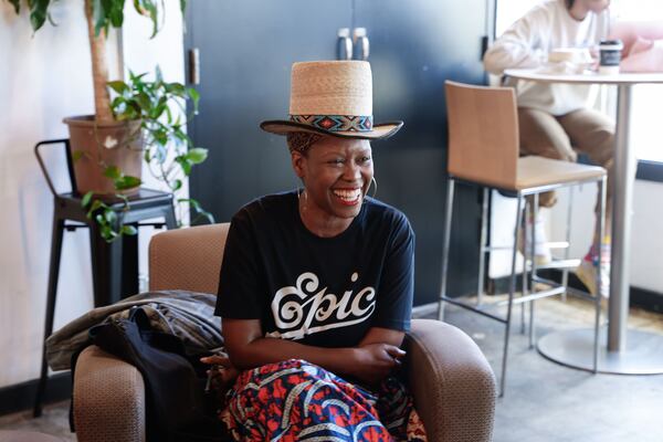 Artist Shanequa Gay shares thoughts with AJC columnist Nedra Rhone during a roundtable discussion about the Fani Willis hearings with local Black women at Black Coffee in Atlanta on Thursday, March 7, 2024. (Natrice Miller/ Natrice.miller@ajc.com)