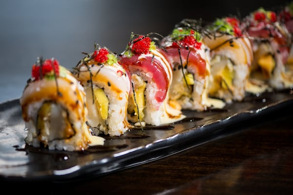  Chanel Replica sushi roll with scallop tempura, mango, fresh scallop, tuna, scallions, red tobiko, soy chilli sauce and creamy wasabi. Photo credit- Mia Yakel.