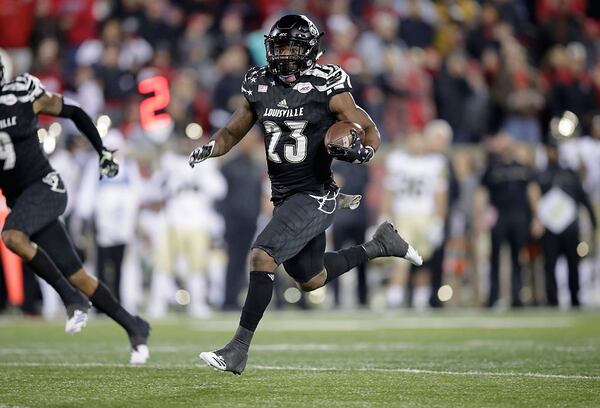 LOUISVILLE, KY - NOVEMBER 12:  Brandon Radcliff #23 of the Louisville Cardinals runs for a touchdown during the game against the Wake Forest Deamon Deacons at Papa John's Cardinal Stadium on November 12, 2016 in Louisville, Kentucky.  (Photo by Andy Lyons/Getty Images)