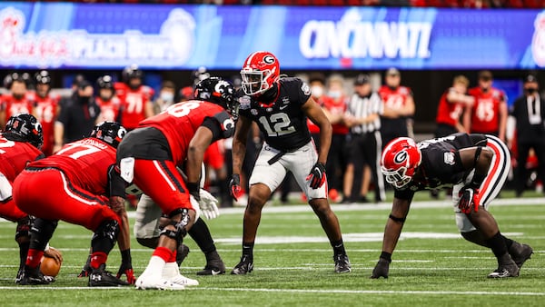 Georgia outside linebacker Rian Davis (12) lines up against Cincinnati in the Chick-fil-A Peach Bowl Jan. 1, 2021, at the Mercedes-Benz Stadium in Atlanta. (Tony Walsh/UGA Athletics)