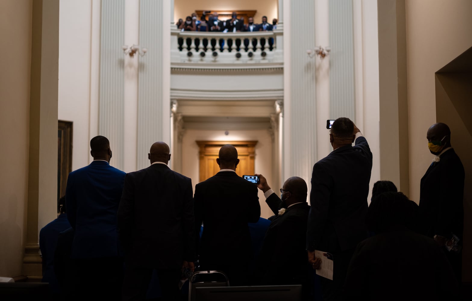 200729-Atlanta-People crowd the balcony to get a view as members of Phi Beta Sigma fraternity sing the fraternity hymn during a ceremony for Rep. John Lewis in the Rotunda of the State Capitol on Wednesday evening July 29, 2020. Ben Gray for the Atlanta Journal-Constitution