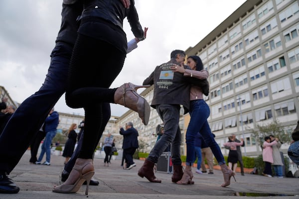 Tango dancers perform for Pope Francis outside the Agostino Gemelli polyclinic in Rome, Sunday, March 16, 2025. (AP Photo/Gregorio Borgia)