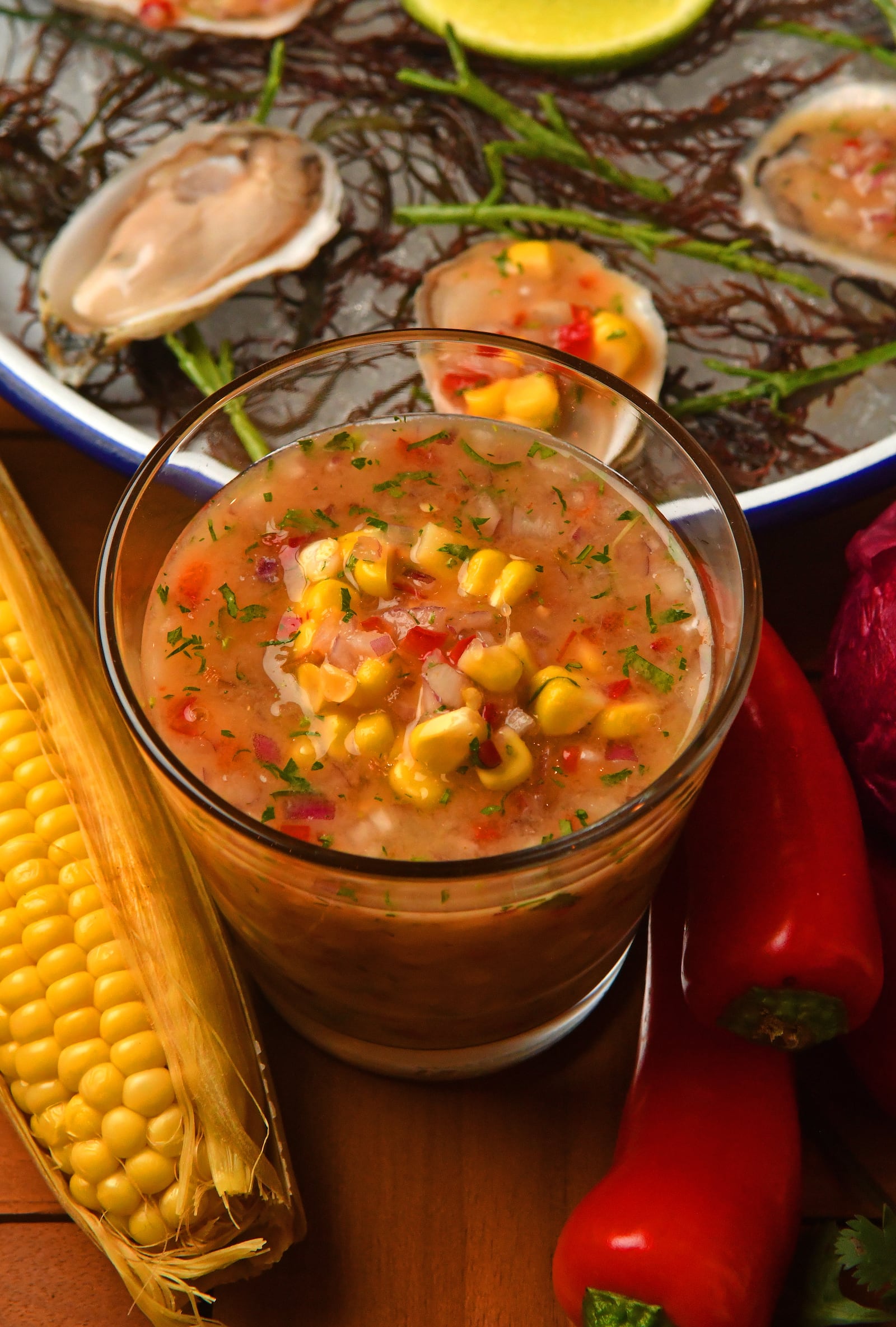 Chef Arnaldo Castillo’s Corn Chalaca salsa, traditionally served over cold mussels in Peru, accompanies Gulf Coast oysters at Tio Lucho’s Peruvian Coastal. (Styling by Manny Sosa / Chris Hunt for The Atlanta Journal-Constitution)