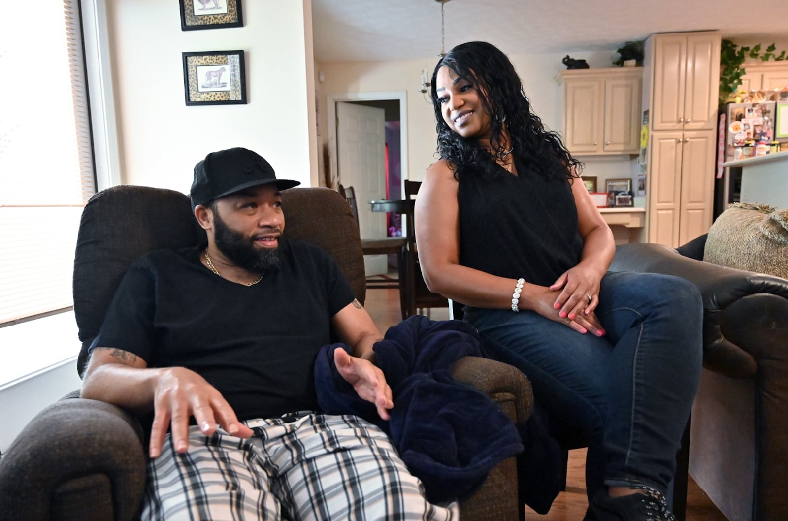  COVID-19 survivor David Simpson with his wife Veronica at their home in West Point. “I was so scared that he was going to die,” said Veronica Simpson, who had just celebrated their 25th wedding anniversary with him before he became ill. “I was praying and asking God to keep him here.”