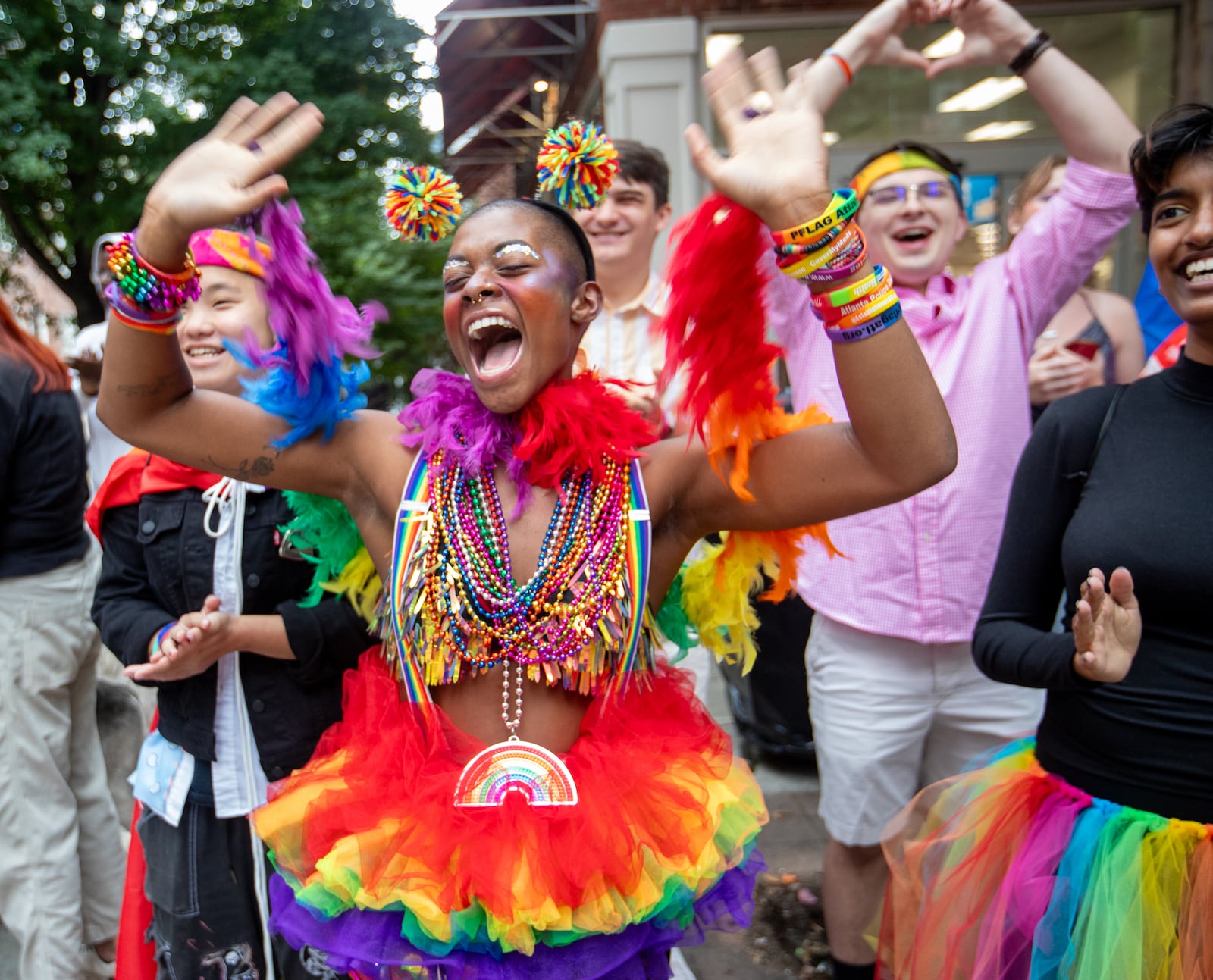 Aliyah Bradley-Davino, who identifies as demifluid, participates in the annual Pride Parade along Peachtree Street on Sunday, Oct. 15, 2023. (Jenni Girtman for the AJC)