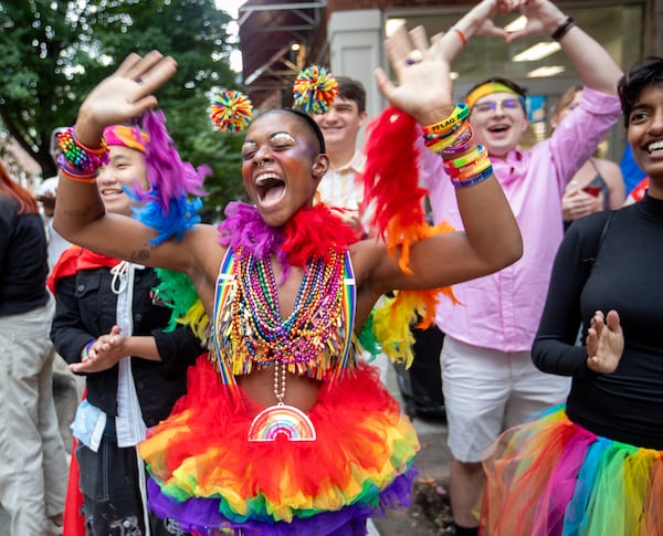 Aliyah Bradley-Davino, who identifies as demifluid, participates in the annual Pride Parade along Peachtree Street on Sunday, Oct. 15, 2023. (Jenni Girtman for the AJC)