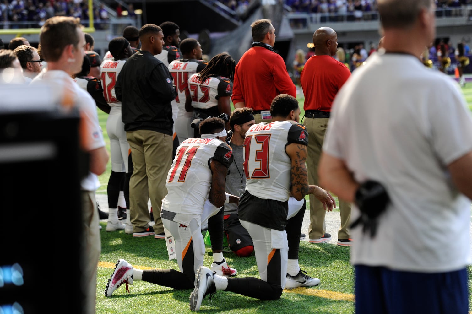 Photos: Falcons show solidarity during National Anthem