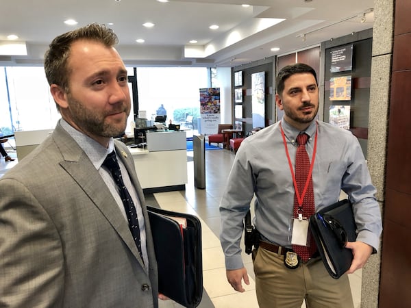 GBI agents Rocky Bigham, left, and Clinton Thomas interviewed AJC reporters Stephen Deere and Dan Klepal on Friday, March 16, 2018, concerning the city of Atlanta’s conduct in responding to open records requests. J. Scott Trubey/strubey@ajc.com.