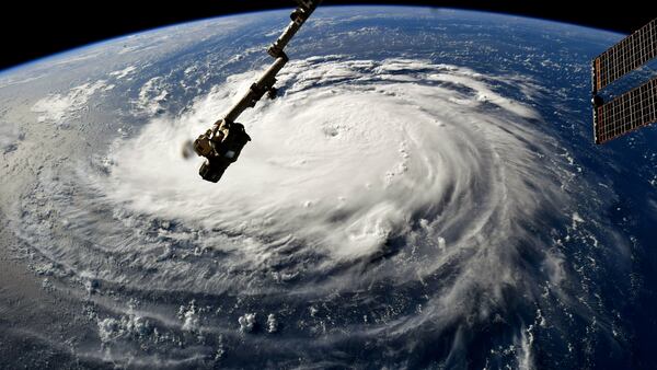 In this NASA handout image taken by Astronaut Ricky Arnold, Hurricane Florence gains strength in the Atlantic Ocean as it moves west, seen from the International Space Station on September 10, 2018.