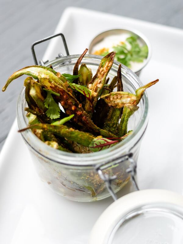 Fried okra comes with raita for dipping at Full Commission in Grant Park. CONTRIBUTED BY HENRI HOLLIS