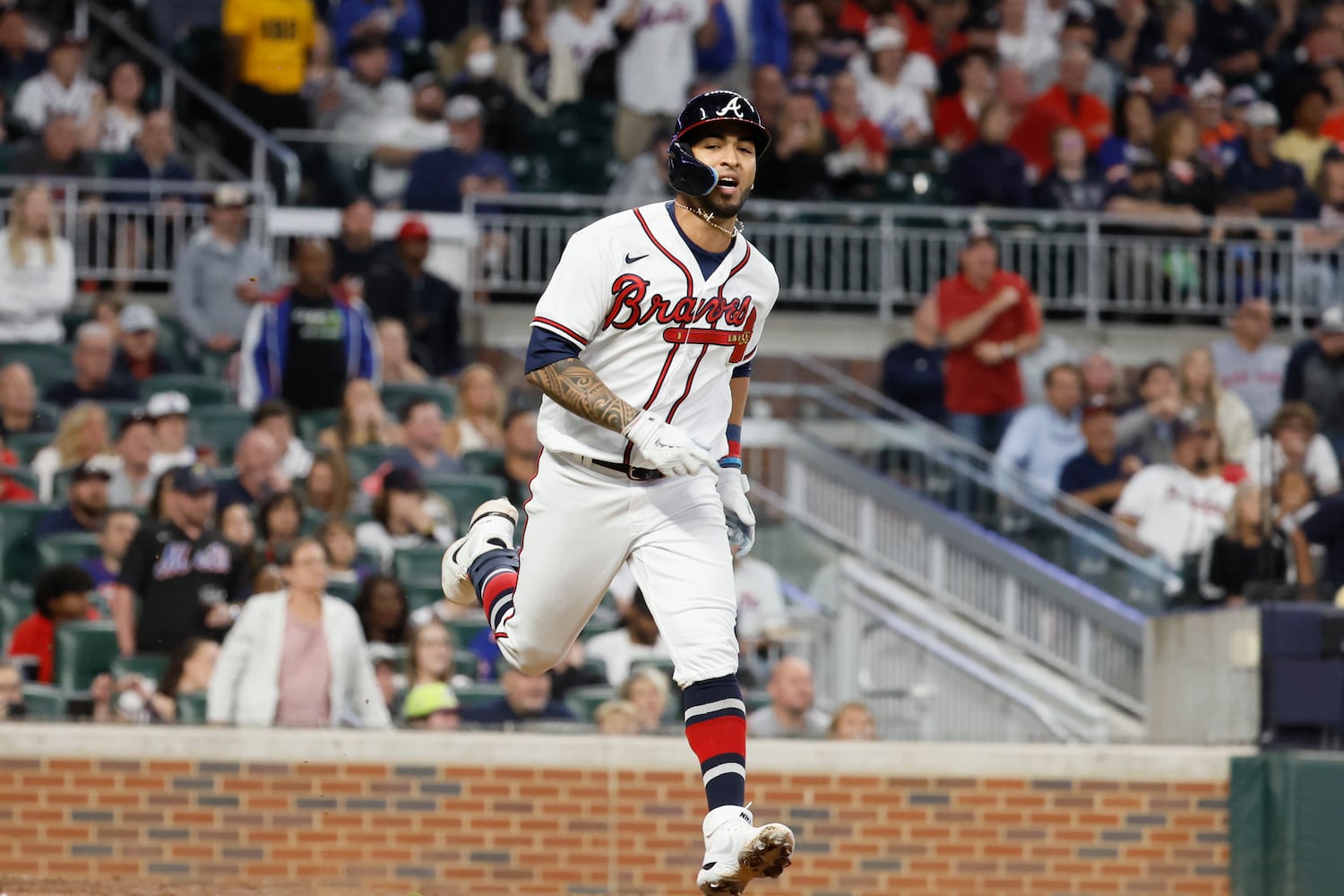 Braves left fielder Eddie Rosario (8) reacts after getting the third out during the fourth inning of a baseball game against the New York Mets at Truist Park on Saturday, October 1, 2022. Miguel Martinez / miguel.martinezjimenez@ajc.com
