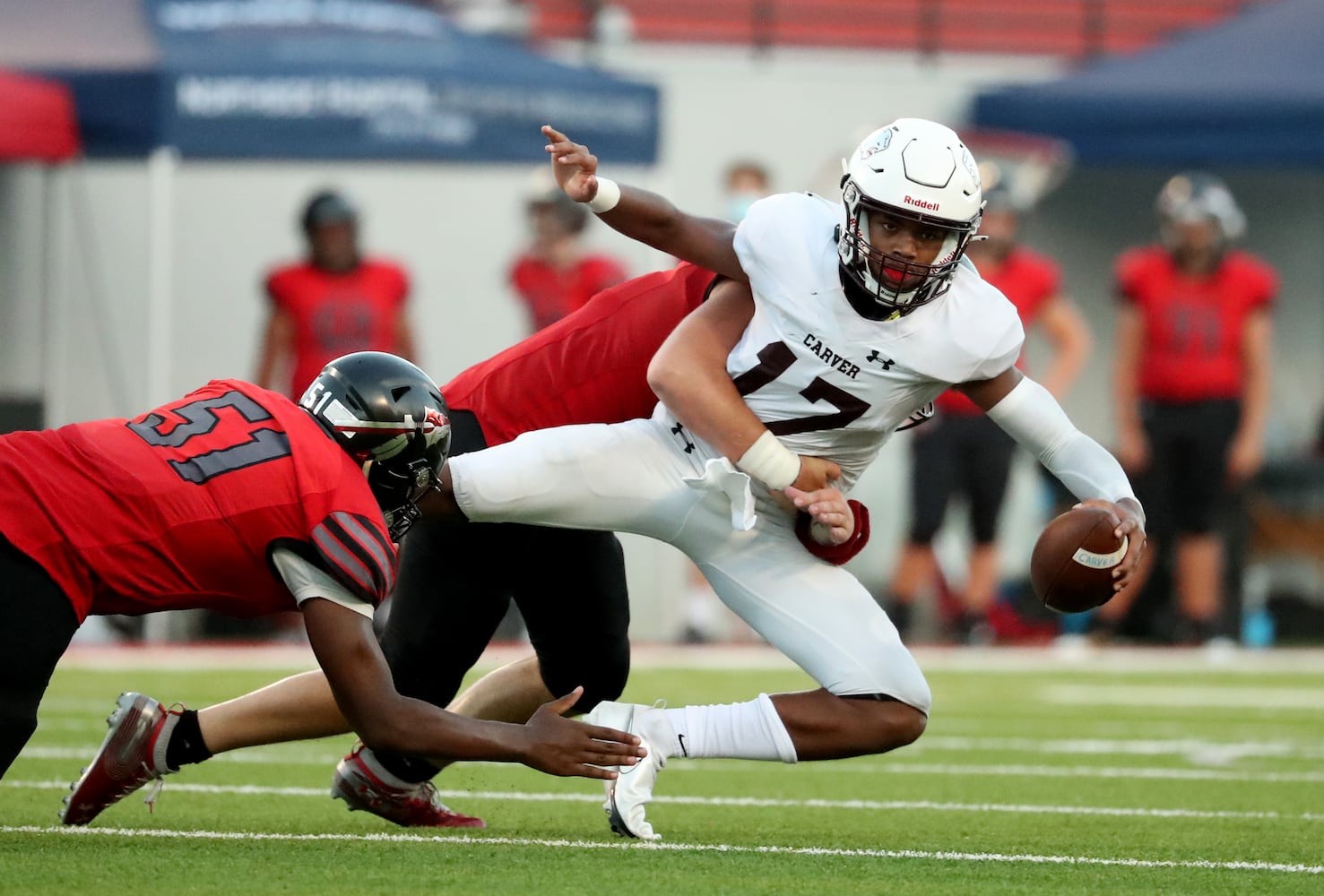 Carver-Atlanta quarterback Lorenza Lennon (17) is sacked by Cherokee defensive lineman Toby Thompson (4) in the second half at Cherokee high school Wednesday, September 2, 2020 in Canton, Ga.. JASON GETZ FOR THE ATLANTA JOURNAL-CONSTITUTION