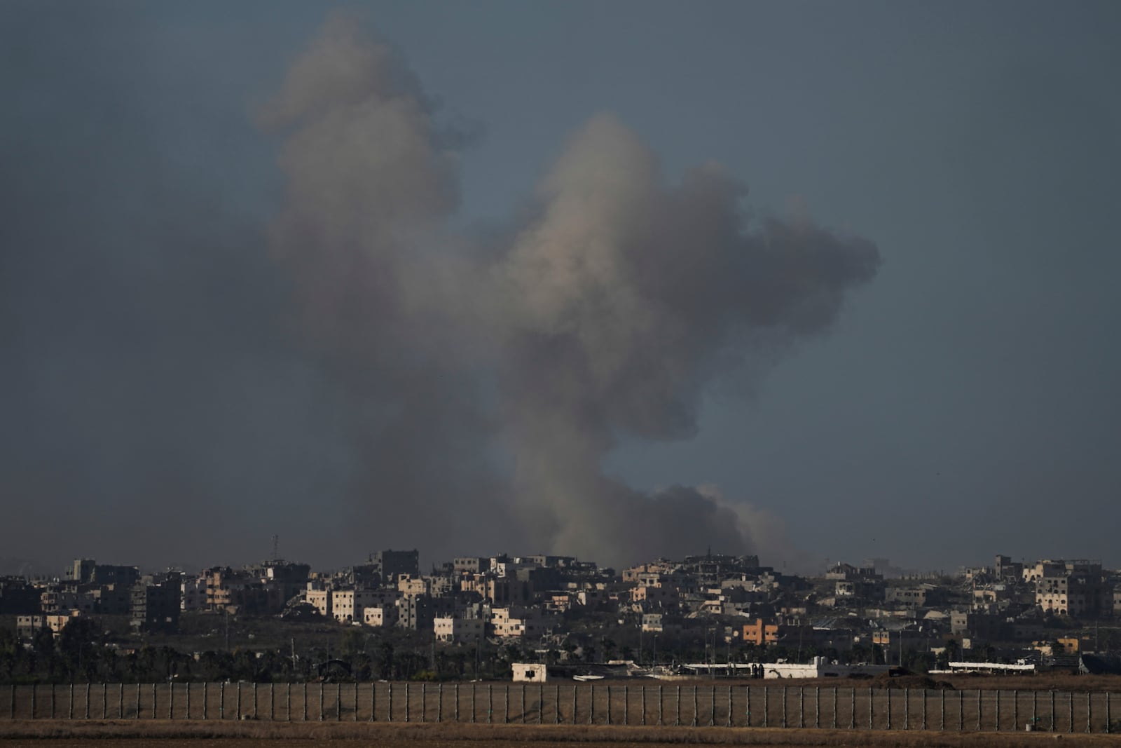 Smoke rises following Israeli bombardment on the Gaza Strip, as seen from southern Israel, Sunday, Oct. 20, 2024. (AP Photo/Tsafrir Abayov)