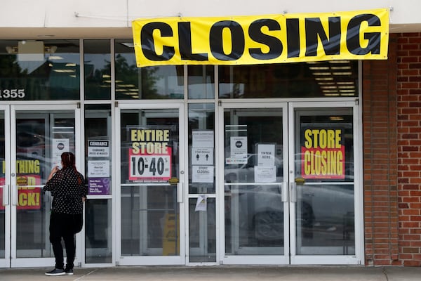 A woman walks into a closing Gordmans store. Stage Stores, which owns Gordmans, is closing all its stores and has filed for Chapter 11 bankruptcy. 