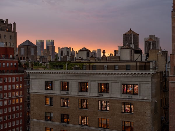 Gail Albert Halaban's “Break The Fast, Yom Kippur, Upper East Side” (2023) is on view at Jackson Fine Art. In her "Neighbors in Buildings" series, viewers can immerse themselves in contemplating the diverse lives led by neighboring New Yorkers.