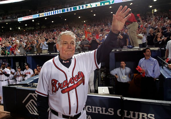 Bobby Cox waves to an adoring crowd at Turner Field after the final game of his managerial career, when the Braves were beaten in the 2010 division series. (AJC fiel photo)