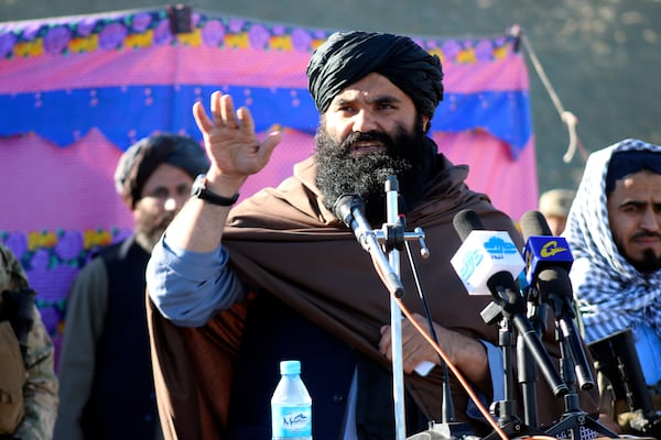 Acting interior minister Sirajuddin Haqqani, speaks during the funeral prayers of Khalil Haqqani, the minister for refugees and repatriation, during his funeral procession in eastern Paktia province, Afghanistan, Thursday, Dec. 12, 2024. (AP Photo/Saifullah Zahir)