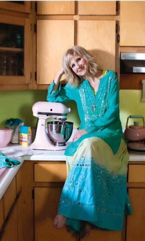 Diane Pfeifer in her Buckhead kitchen. Pfeifer, 66, is a frequent volunteer who has enjoyed many careers, including singer, songwriter and the maker of Grits Bits. CONTRIBUTED BY SARAH D’ORIO