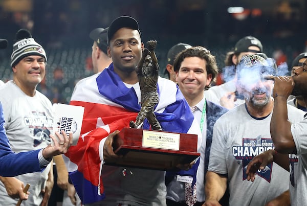 The MVP Jorge Soler holds his trophy after beating the Astros in game 6 to win the World Series on Tuesday, Nov. 2, 2021, in Houston.   “Curtis Compton / Curtis.Compton@ajc.com”