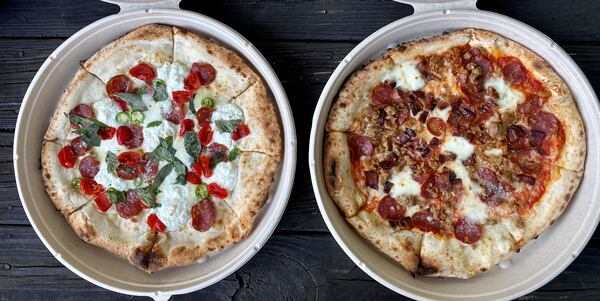 Takeout from Ammazza: the fuoco bianco and the carne pies. 
Wendell Brock for The Atlanta Journal-Constitution