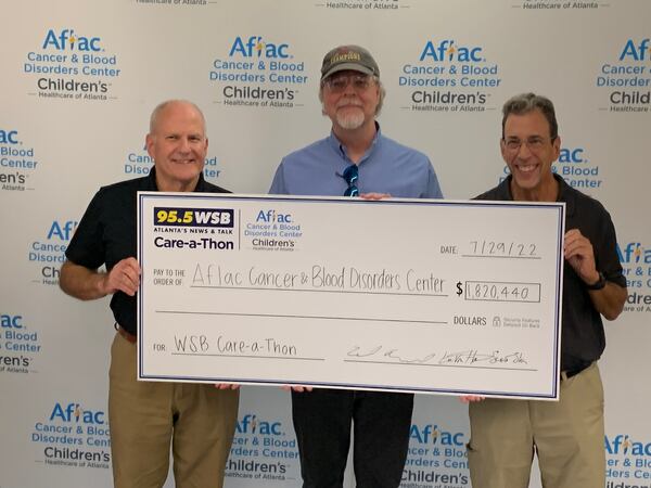 WSB listeners last week raised more than $1.8 million for the AFLAC Cancer and Blood Disorders Center, the most ever for this long-running annual radiothon. Scott Slade, Eric Von Haessler and Clark Howard closed out the careathon July 29, 2022. RODNEY HO/rho@ajc.com