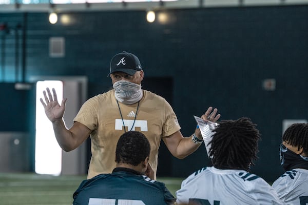 Georgia Tech coach Geoff Collins addresses his team at a summer training session July 22, 2020.