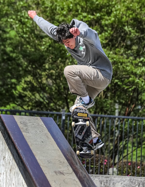 Monday's chilly weather didn’t stop Alejandro Perez as he skated at the Brook Run Skate Park in Dunwoody. (John Spink / John.Spink@ajc.com)

