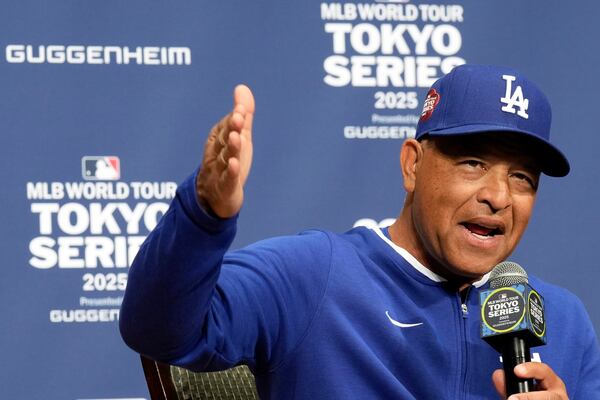 Los Angeles Dodgers manager Dave Roberts attends the official Press conference Friday, March 14, 2025, in Tokyo, as the Dodgers play their MLB opening games against the Chicago Cubs at Tokyo Dome next week. (AP Photo/Eugene Hoshiko)