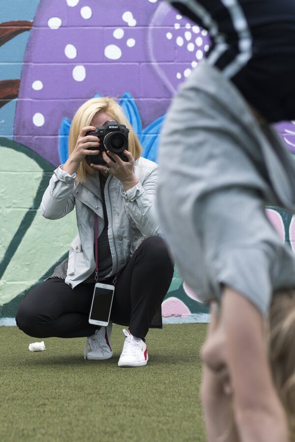 Kate T. Parker photographs Sadi Pennington, who is featured in her new photo book, “Strong Is the New Pretty.” DAVID BARNES / SPECIAL