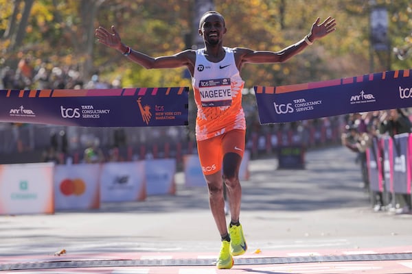 Abdi Nageeye, of the Netherlands, crosses the finish line to win the men's division of the New York City Marathon, Sunday, Nov. 3, 2024, in New York. (AP Photo/Frank Franklin II)