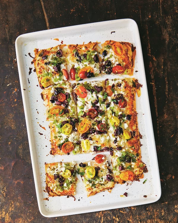 Flaky Veggie Phyllo “Pizza” is made in a sheet pan and takes less than 15 minutes to prepare. 
 
Reprinted with permission from “The Mediterranean Dish: Simply Dinner” by Suzy Karadsheh, copyright© 2024. Photographs by Caitlin Bensel. Published by Clarkson Potter, a division of Penguin Random House, LLC.