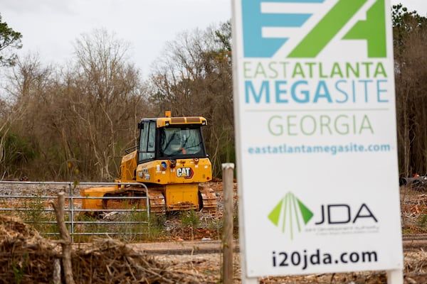 A view of construction equipment at the Rivian factory site in southern Walton and Morgan counties on Friday, March 8, 2024. The electric vehicle upstart announced more than two years ago plans to build a $5 billion vehicle and battery plant, but announced it is halting the project Thursday. (Arvin Temkar / arvin.temkar@ajc.com)