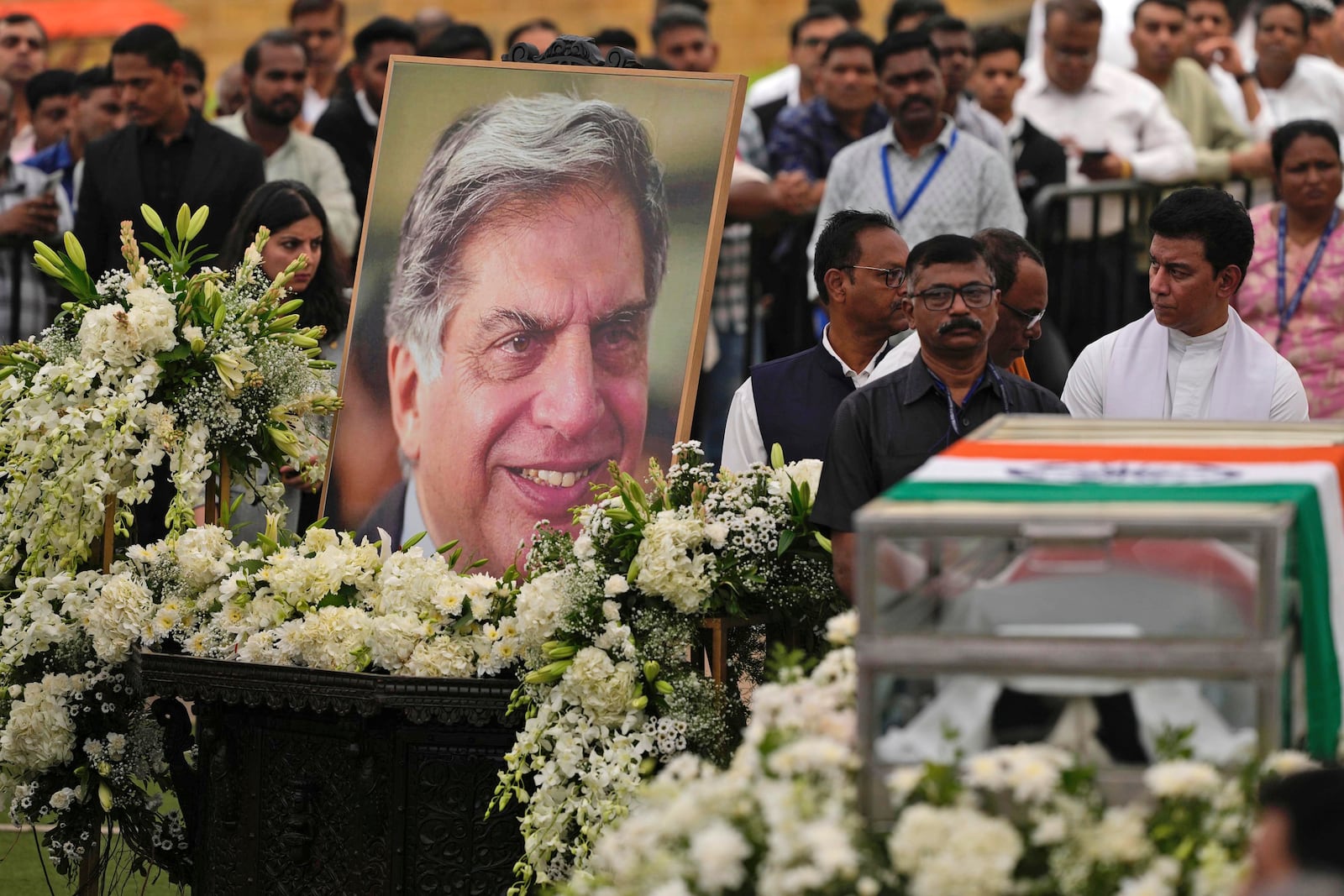 People pay homage to Indian business leader Ratan Tata who died on Wednesday night, in the lawns of the National Centre for the Performing Arts (NCPA), in Mumbai, India, Thursday, Oct. 10, 2024. (AP Photo /Rafiq Maqbool)