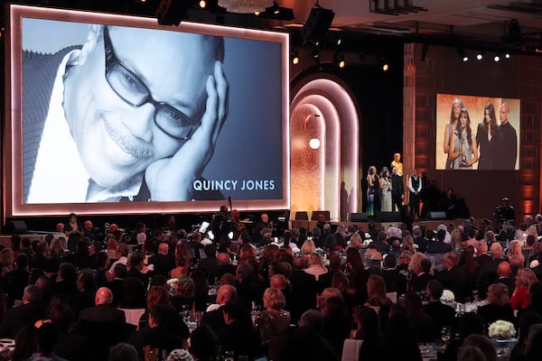 Martina Jones, from left, Rashida Jones, and Quincy Jones III accept a posthumous Honorary Award for Quincy Jones during the 15th Governors Awards on Sunday, Nov. 17, 2024, at The Ray Dolby Ballroom in Los Angeles. (AP Photo/Chris Pizzello)