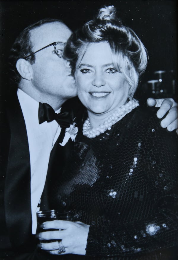 Kathy Scruggs, right, and her brother, Lewis, are shown in a photograph together. Scruggs is portrayed in "Richard Jewell" as a hard-charging reporter who favored short skirts and high heels, while friends and former colleagues at both the AJC and prior newspapers also recall her caring spirit, her professional dedication and her unparalleled skill at developing sources and drive to ferret out information.