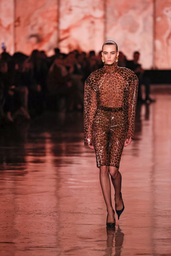 A model wears a creation as part of the Saint Laurent Fall/Winter 2025-2026 Womenswear collection presented Tuesday, March 11, 2025. in Paris. (AP Photo/Thomas Padilla)