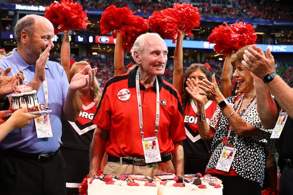 Former UGA football coach Vince Dooley is featured in a new campaign ad for U.S. Senate hopeful Herschel Walker. Dooley is pictured celebrating his 90th birthday before a Georgia game on Sept. 3, 2022, in Atlanta. (Curtis Compton/AJC)