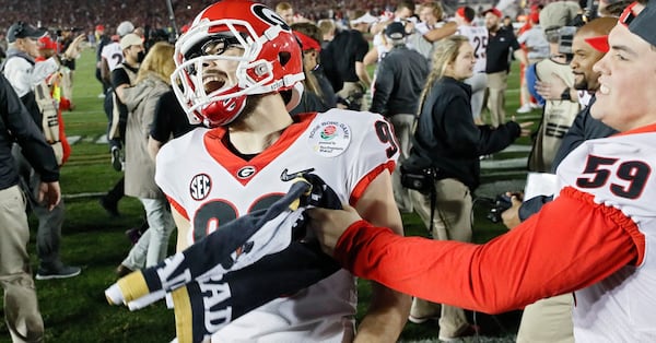 Georgia Bulldogs place-kicker Rodrigo Blankenship (98) celebrates after Georgia won  the College Football Playoff semifinal at the Rose Bowl on Monday, Jan.  1, 2018, in Pasadena, Calif.