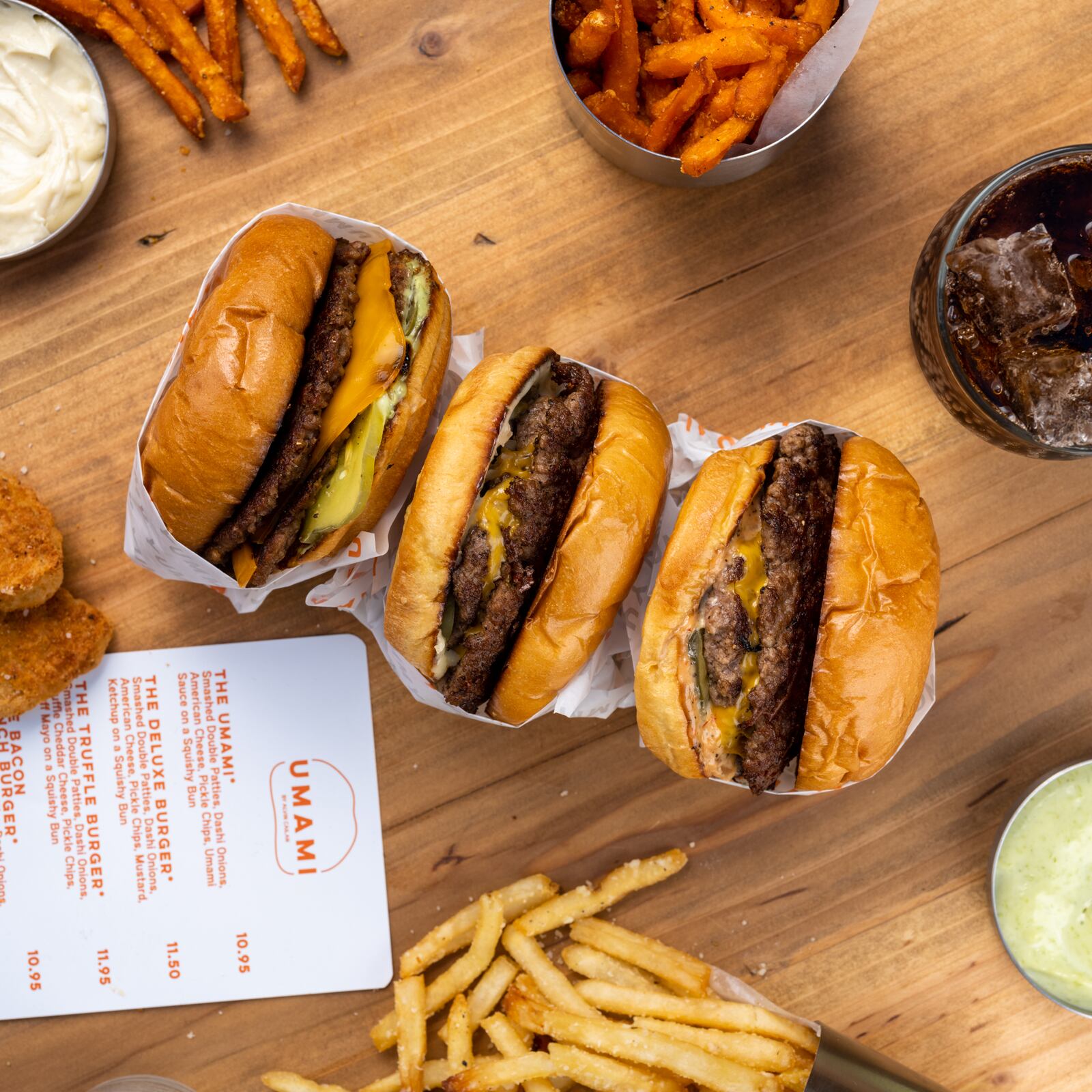 Burgers from the menu of Umami Burger, opening in Citizens Market food hall at Phipps Plaza. / Courtesy of C3