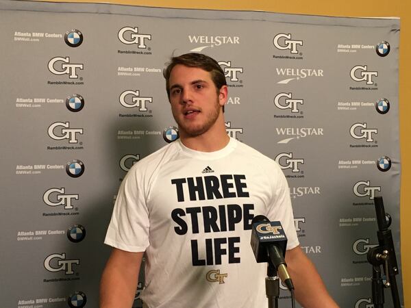 Georgia Tech linebacker Brant Mitchell models an Adidas t-shirt while speaking to media April 18, 2018 at Bobby Dodd Stadium. (AJC photo by Ken Sugiura)