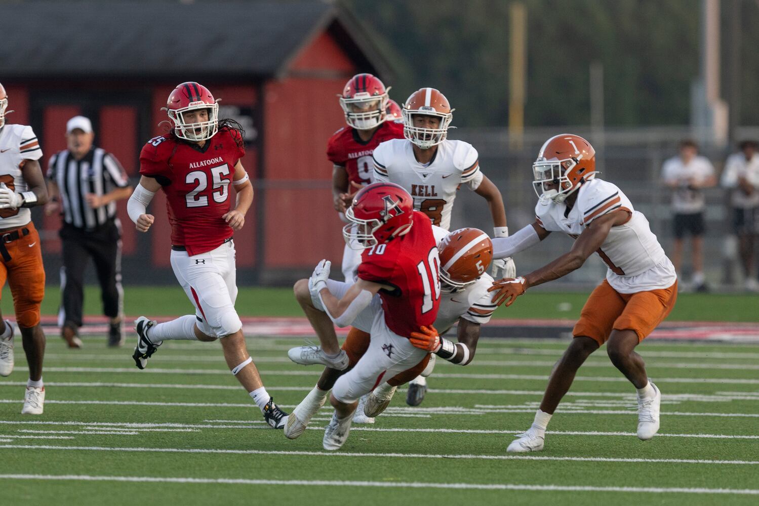 Allatoona’s Camden Phillips (10) is tackled. (Photo/Jenn Finch)