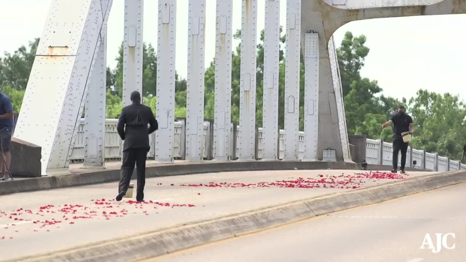 John Lewis final march across Edmund Pettus Bridge